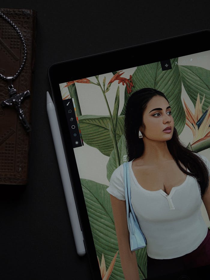 The Art of Drawing Readers In: Your attractive post title goes here Artistic digital rendering of a woman on a tablet screen, showcasing modern creativity.